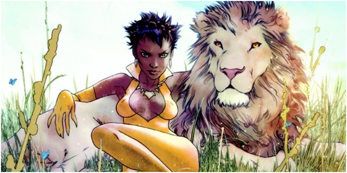 Vixen sitting with a lion in DC Comics.