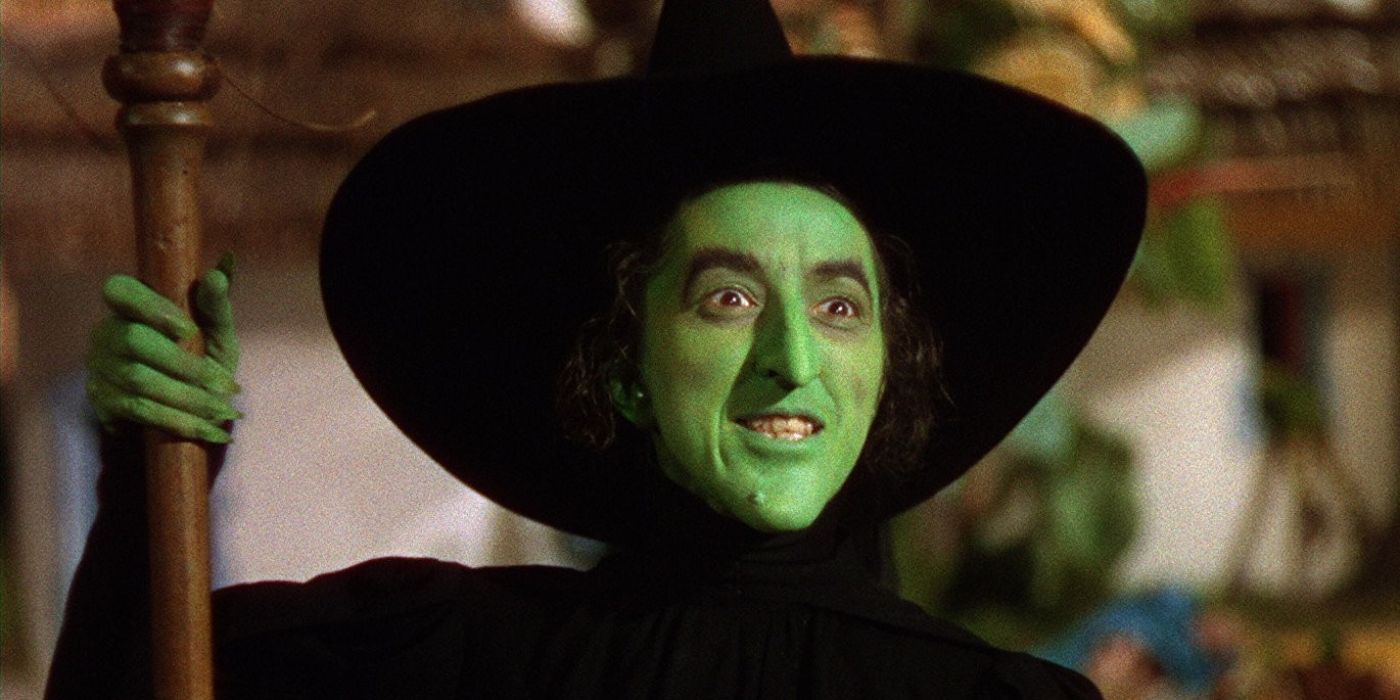 The Wicked Witch of the West looks condescendingly at Dorothy in The Wizard of Oz.