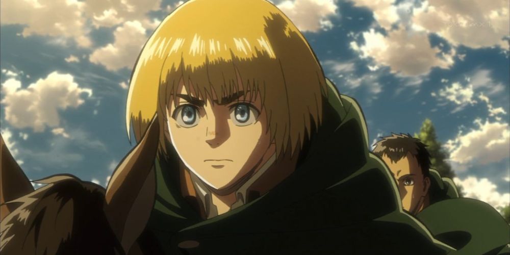 Armin on horseback heading into battle in Attack On Titan.