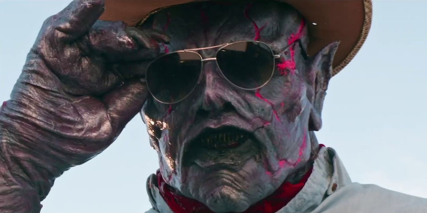 psycho goreman glasses and cowboy hat