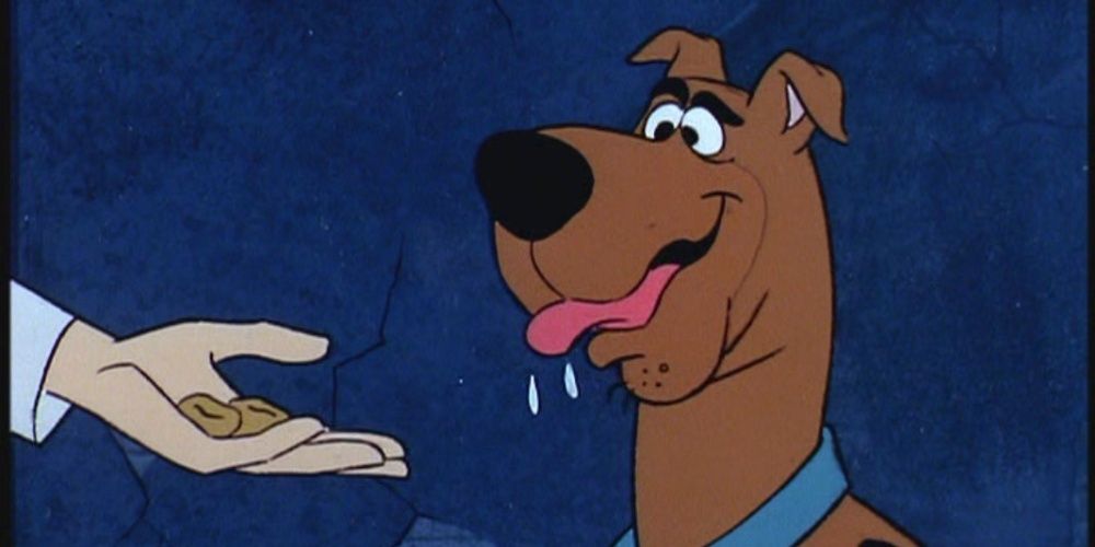 Scooby-Doo drooling because he's about to eat Scooby Snacks.
