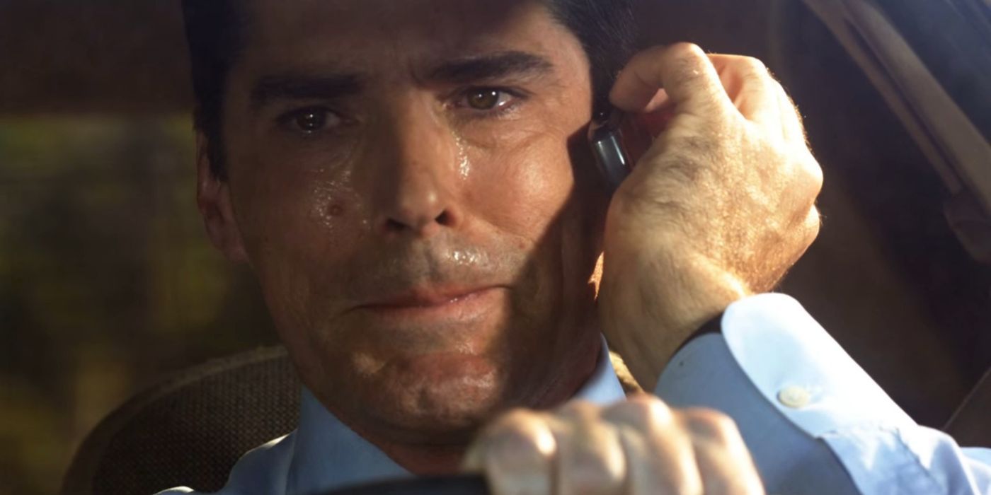 Hotch crying on the phone with Foyet and Haley in Criminal Minds.