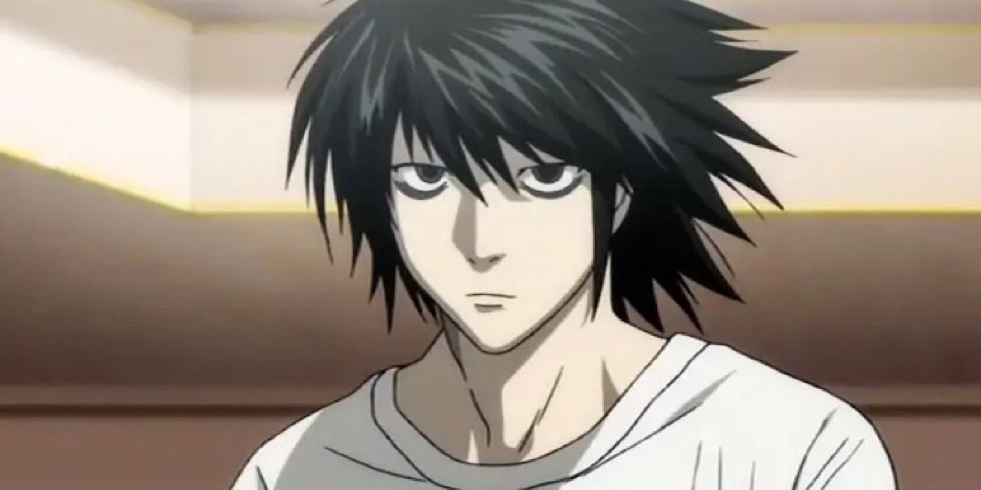 L looking angry with lights behind him in Death Note.