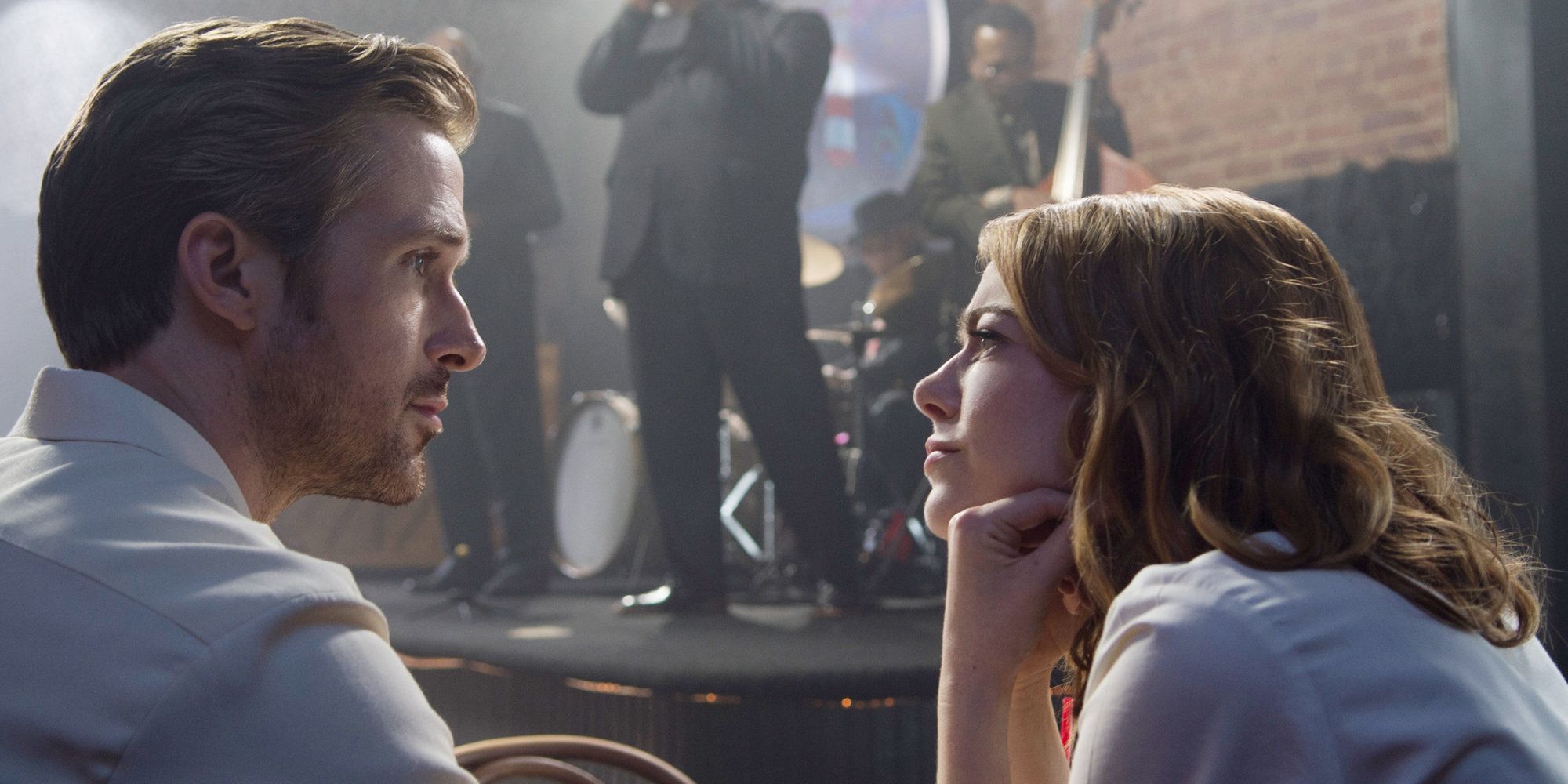 Ryan Gosling and Emma Stone look into each other's eyes in La La Land