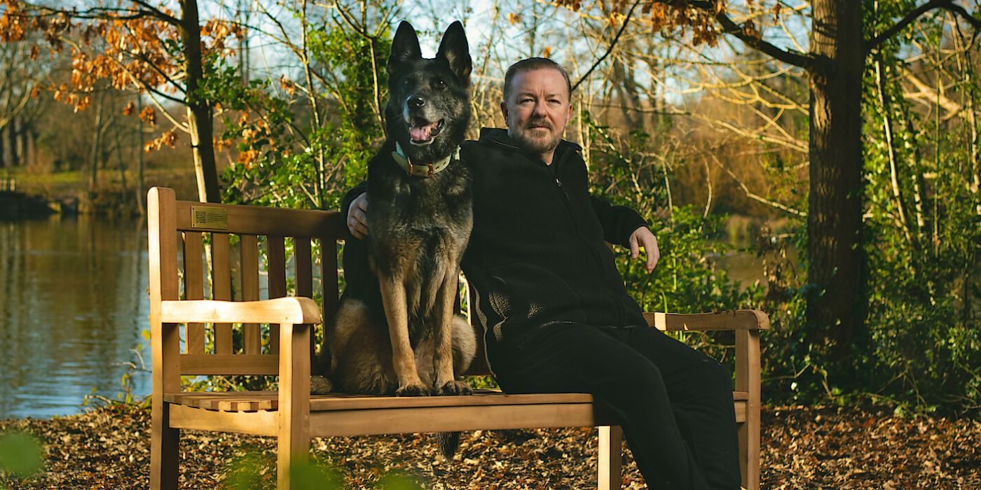 Ricky Gervais sitting with a dog in After Life