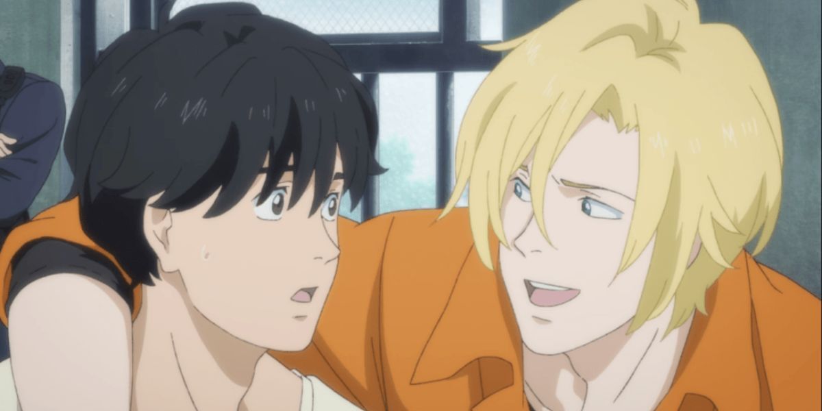 Image features a visual from Banana Fish: (From left to right) Eiji Okumura (short, black hair and white shirt) is looking at Ash Lynx (medium-length, blond hair and orange jumpsuit) who has his arm over his shoulder.