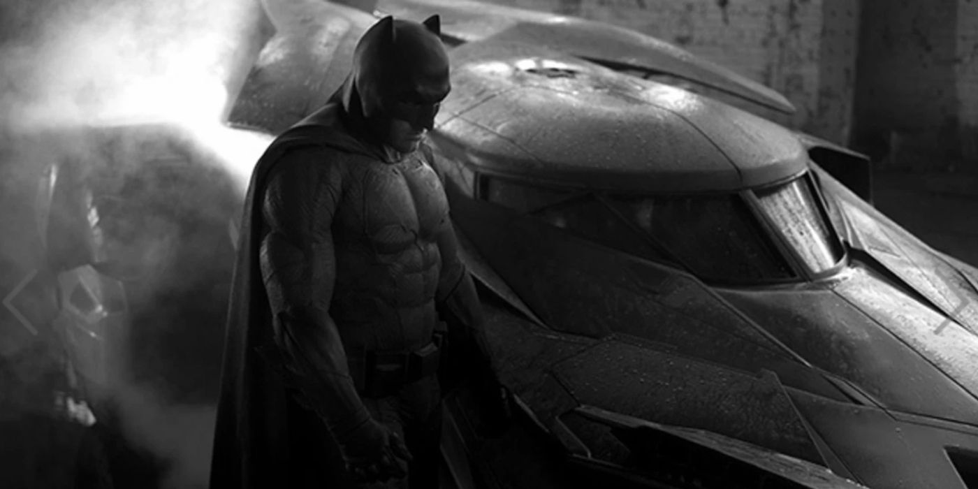 'Batfleck' standing by the Batmobile