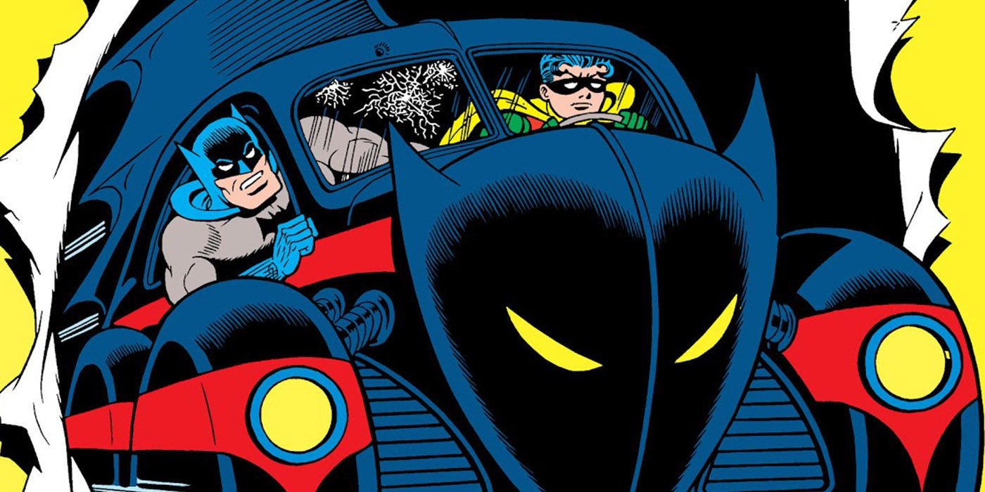 Batman and Robin drive the Batmobile