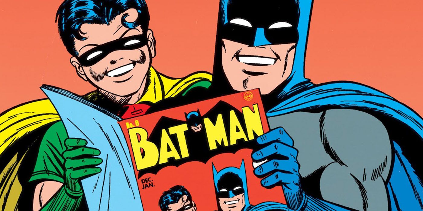 Batman and Robin read their own DC comic