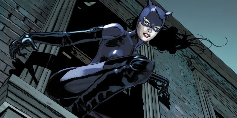 Selina Kyle Catwoman climbing a window in DC comics