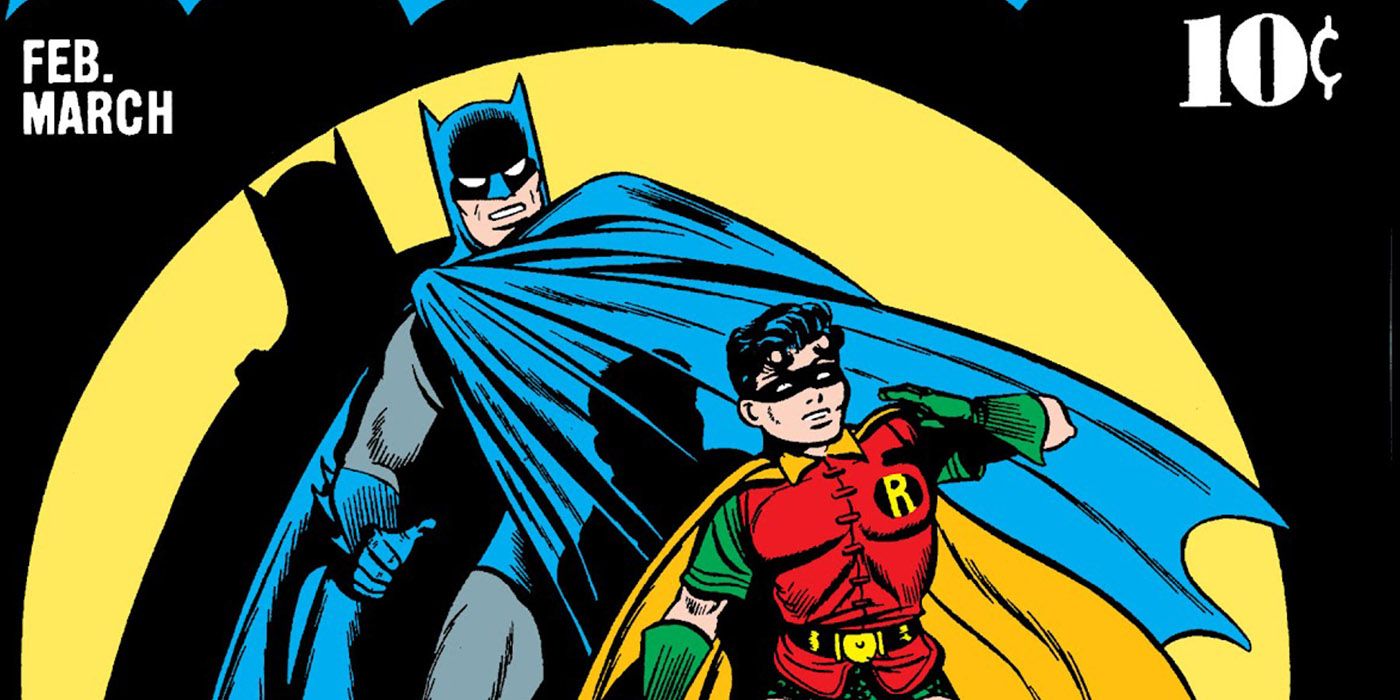 Golden Age Batman and Robin stand in spotlight