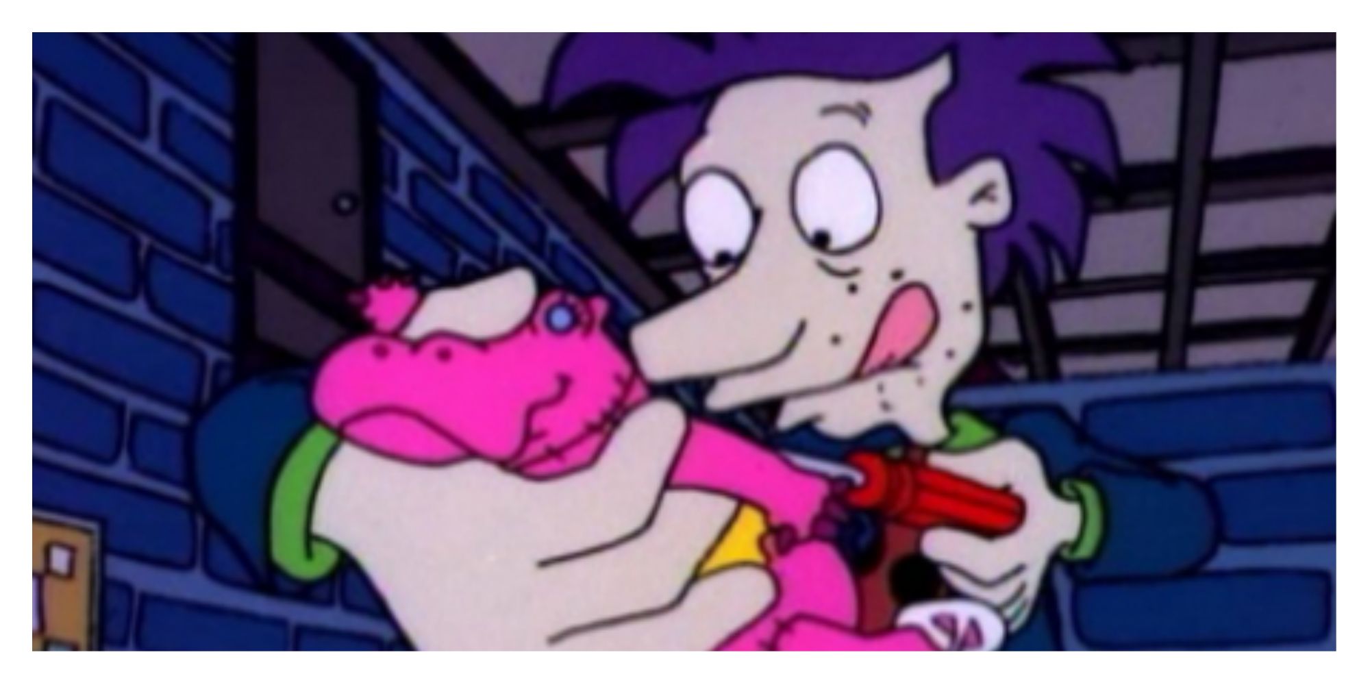 Stu Pickles inventing a toy in Rugrats