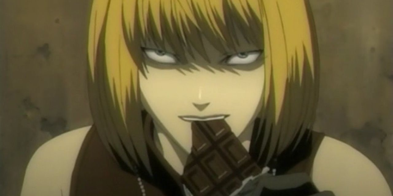 Mello munches on a chocolate bar in Death Note