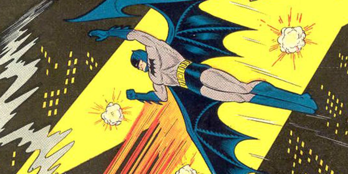 Batman flies over Gotham in a wing suit