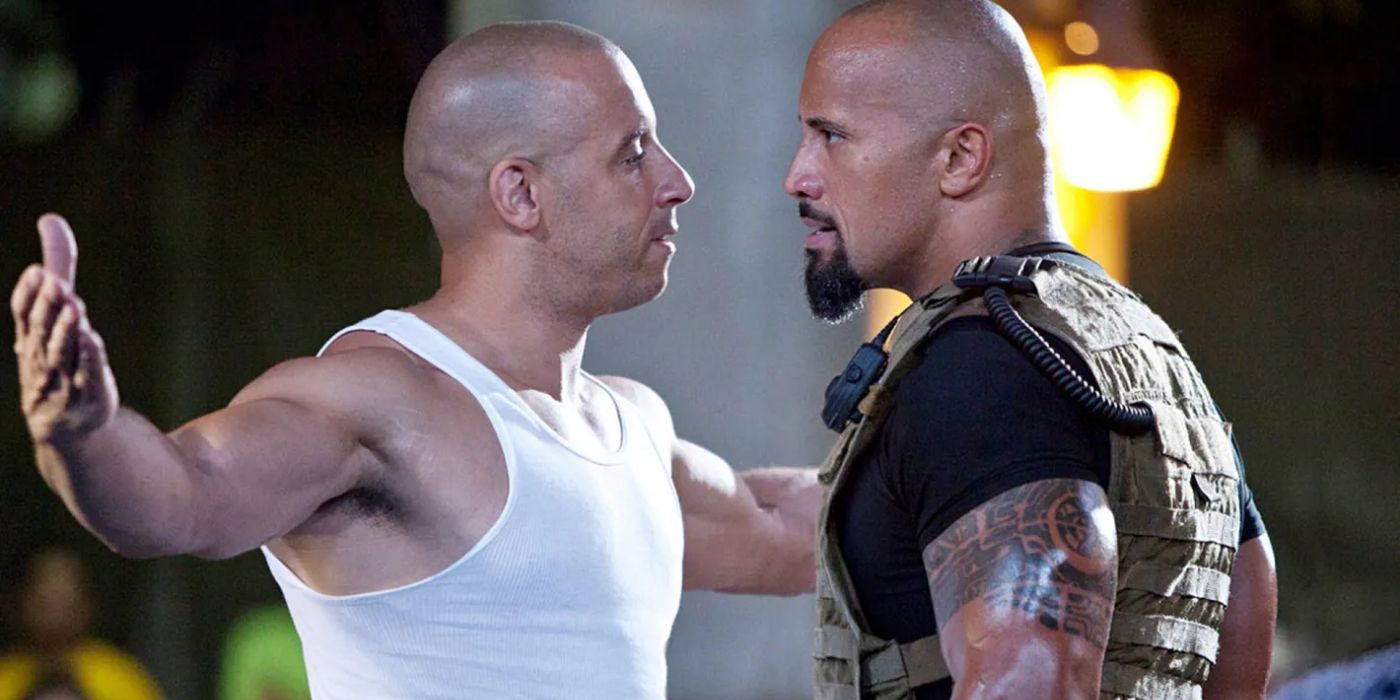 Dom and Hobbs stare each other down in Fast Five.