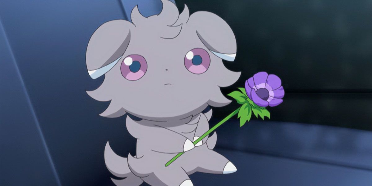 A grieving Espurr brings a flower for friend's grave in Pokemon