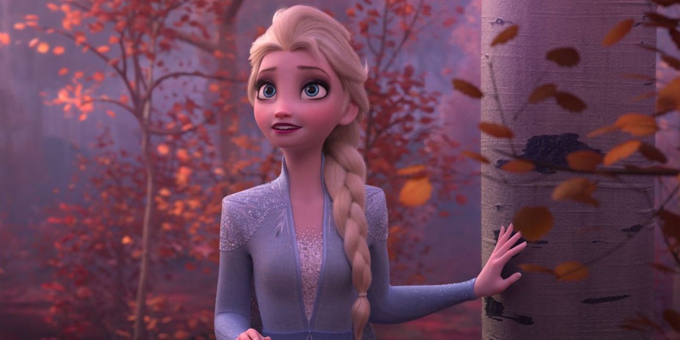 Elsa with her hand against a tree in a forest