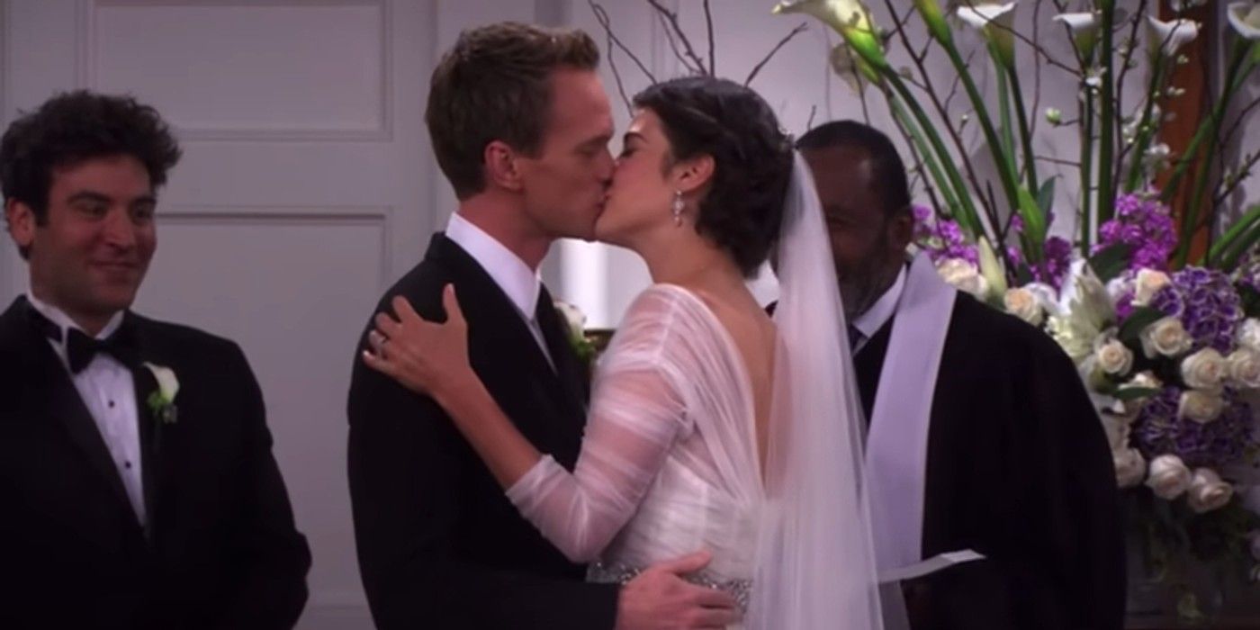 Barney & Robin kiss at their wedding in How I Met Your Mother 