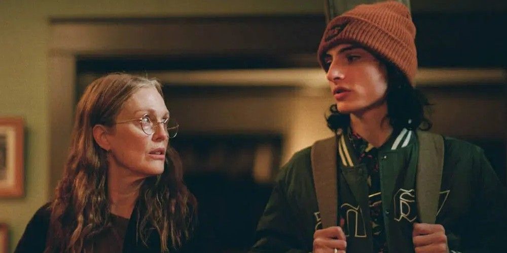Julianne Moore and Finn Wolfhard in When You Finish Saving the World