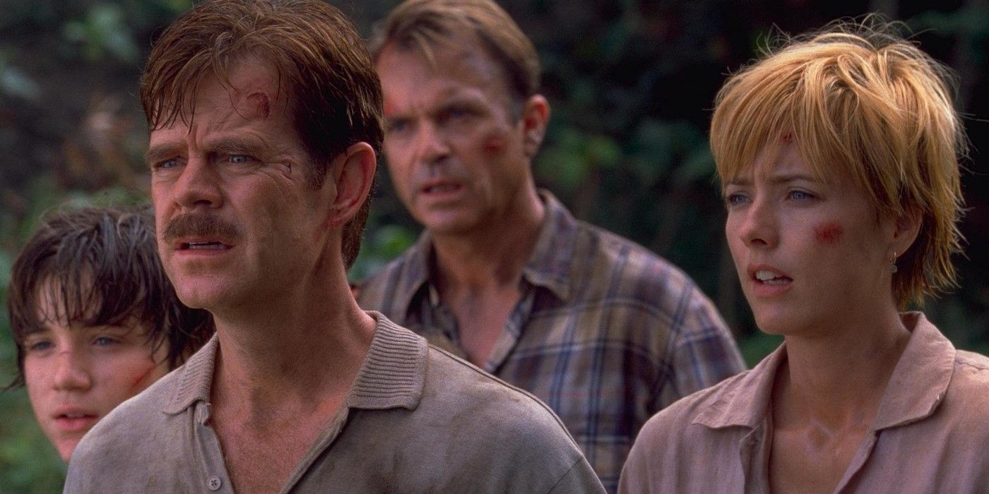 Alan Grant and the Kirby family standing bloodied and bruised in Jurassic Park 3.