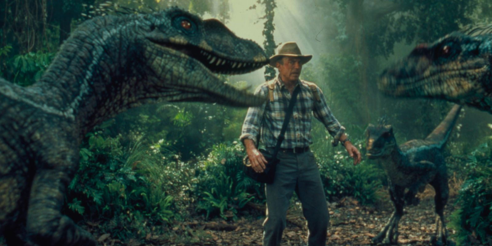 Alan Grant among some raptors in Jurassic Park 3.