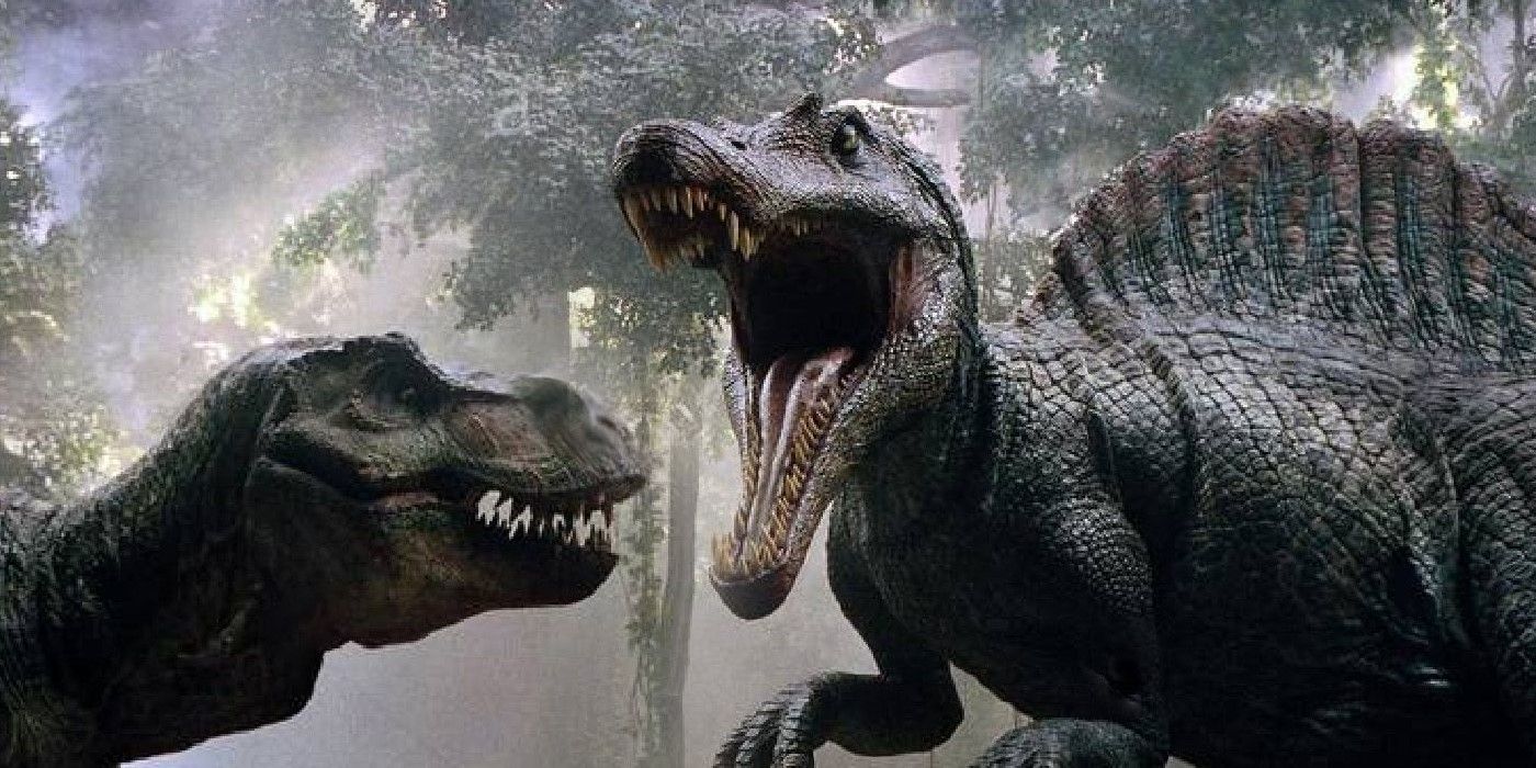 Um Spinosaurus rugindo para um T-Rex em Jurassic Park.
