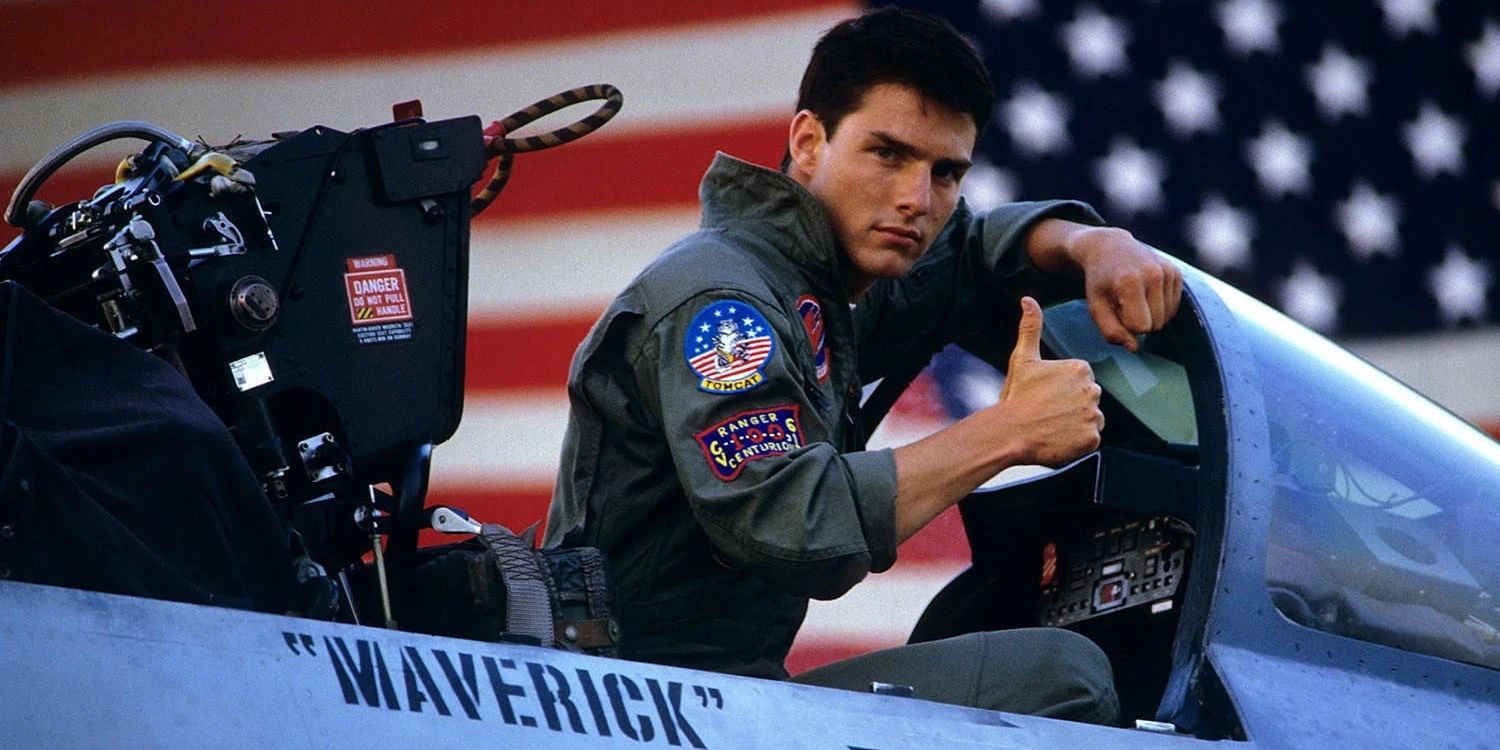 TOM CRUISE as LT Pete "Maverick" Mitchell In Top Gun (1986), sitting in "Maverick."