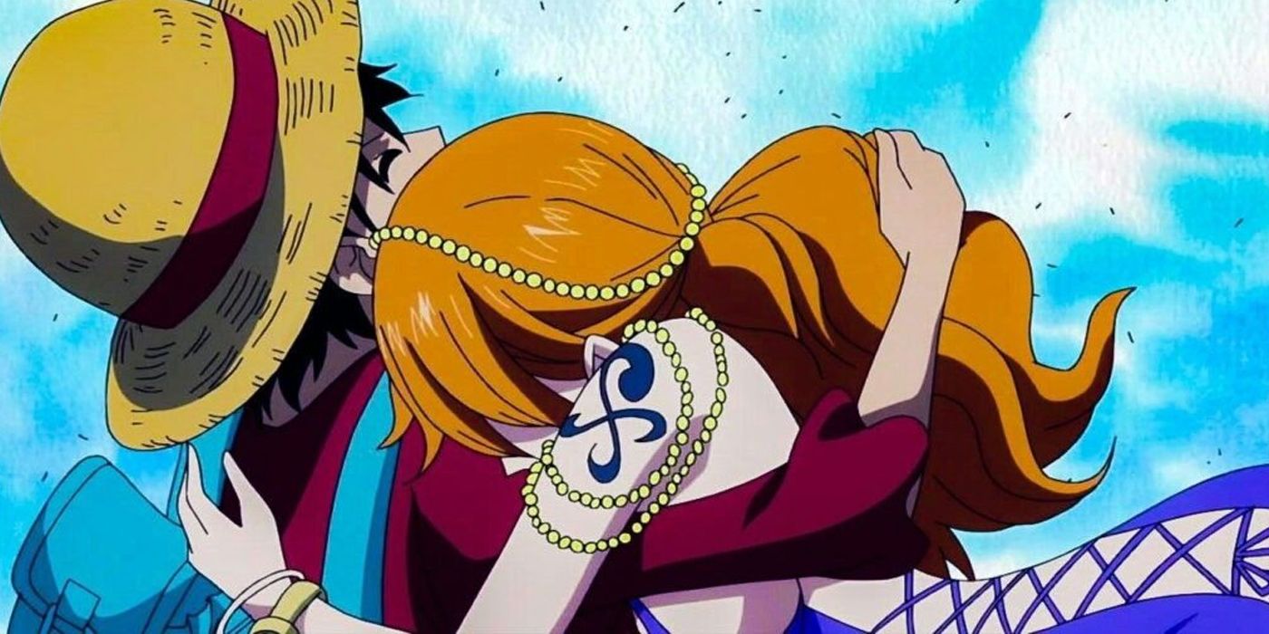 Nami memeluk Luffy setelah bersatu kembali di anime One Piece.