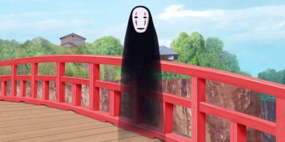 No Face floats on the bridge in Spirited Away