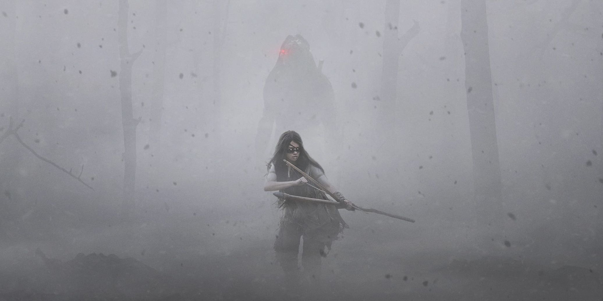 Prey: Naru looks for the Predator in the fog, unaware the Predator is behind her