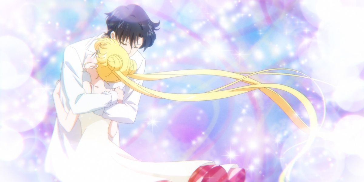 Usagi and Mamoru embrace amid a backdrop of pastel stars in Sailor Moon Crystal