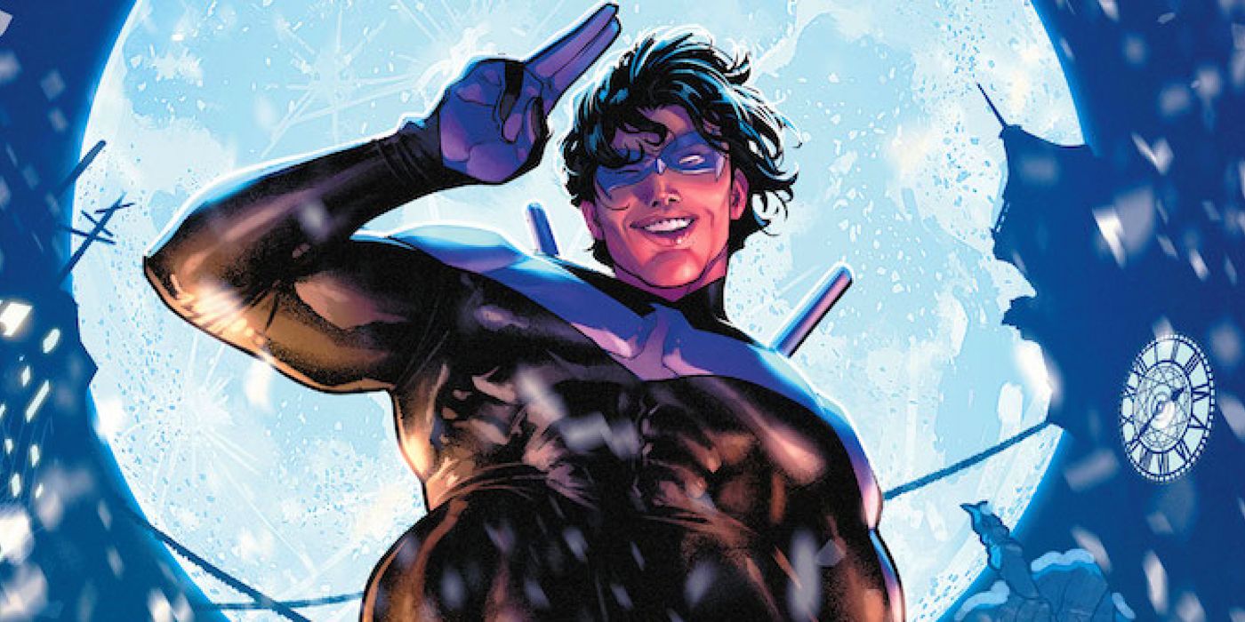 Dick Grayson as DC Comics' Nightwing, smiling and saluting in his sharp new costume.