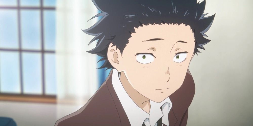Shoya Ishida frowning in front of a window in A Silent Voice.