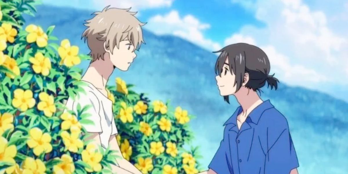 Mio Chibana smiling at a surprised Shun Hashimoto as they stand next to a flowered bush in Stranger by the Shore