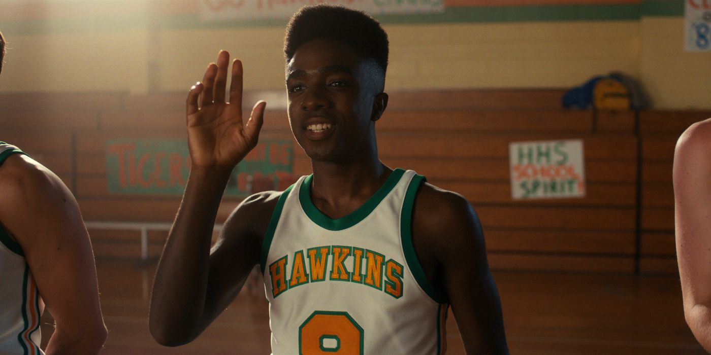 Lucas Sinclair in a basketball uniform waving