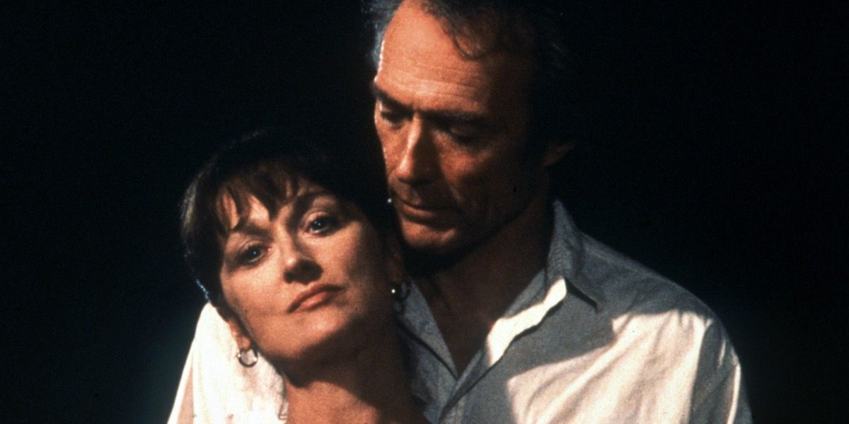 Robert holds Francesca against is chest in The Bridges Of Madison County (1995)