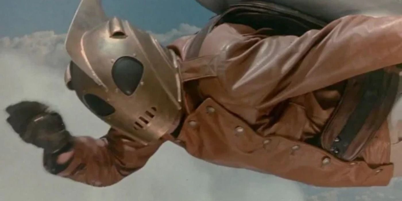 Clifford Secord/The Rocketeer (Bill Campbell) waves at airline passengers in mid-flight in a scene from 1991's The Rocketeer.