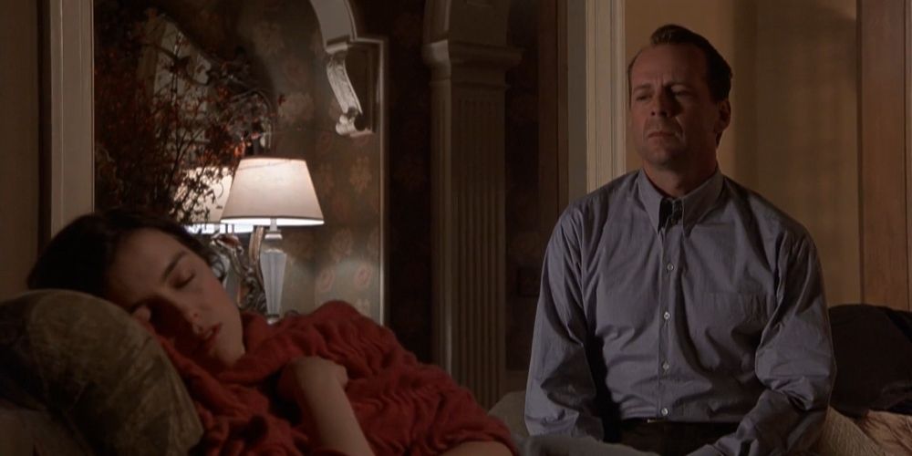 Malcom Crowe tries to talk to his sleeping wife in The Sixth Sense