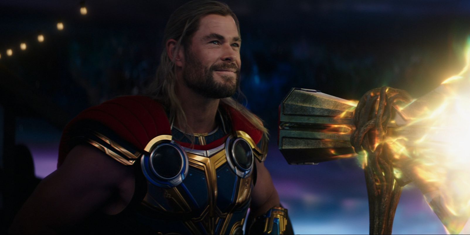 Thor holding stormbreaker in Love & Thunder