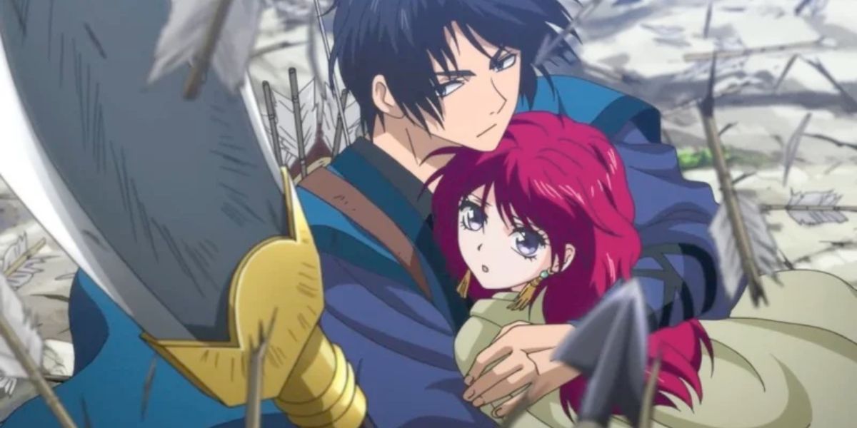 Image features a visual from Yona of the Dawn: (From left to right) Hak (short, black hair and blue robe) is protecting Yona (long, red hair, green cape, and pink and red dress) with his spear.
