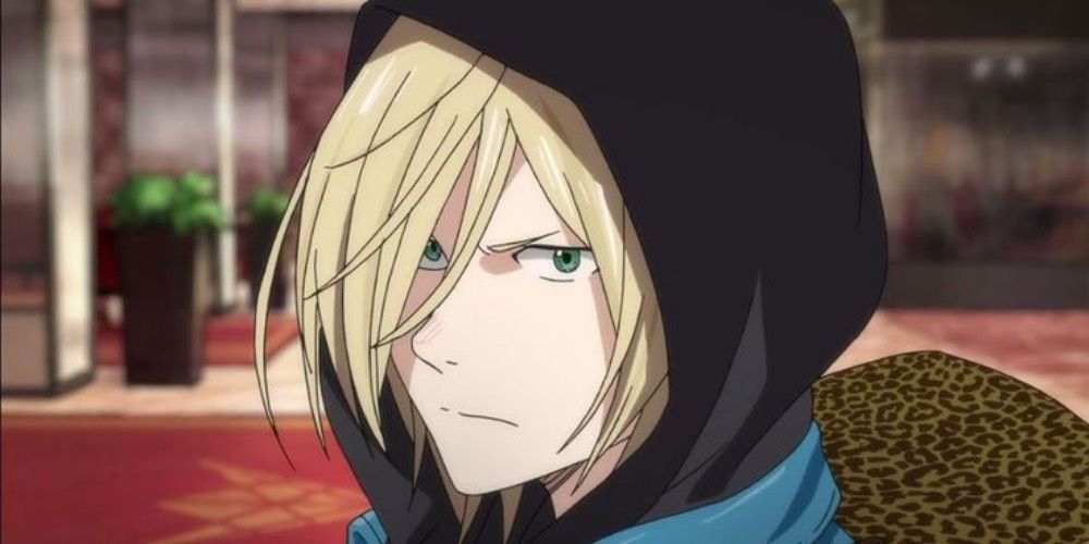 Yuri Plisetsky from Yuri!!! On Ice wearing a hood and casting a glaring look.