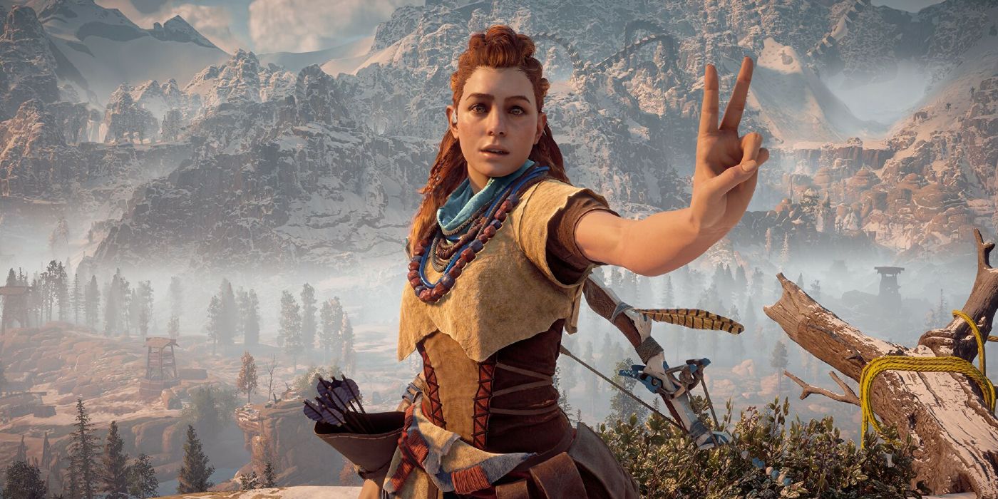Aloy from Horizon Zero Dawn points two fingers up.