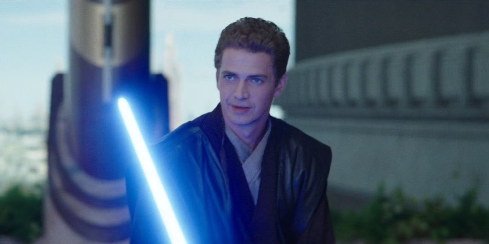 Anakin Skywalker holding a lightsaber