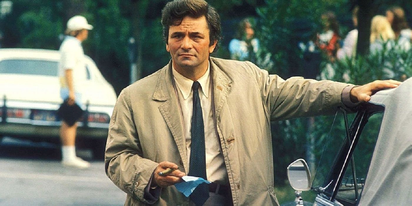 Columbo leaning on a car