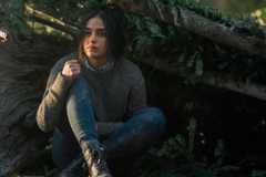 Liv sitting in the ground in Keep Breathing tv show 