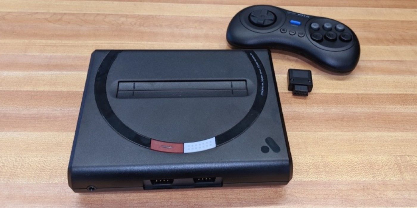 Analogue Mega SG with a Bluetooth wireless controller and Genesis-configured dongle