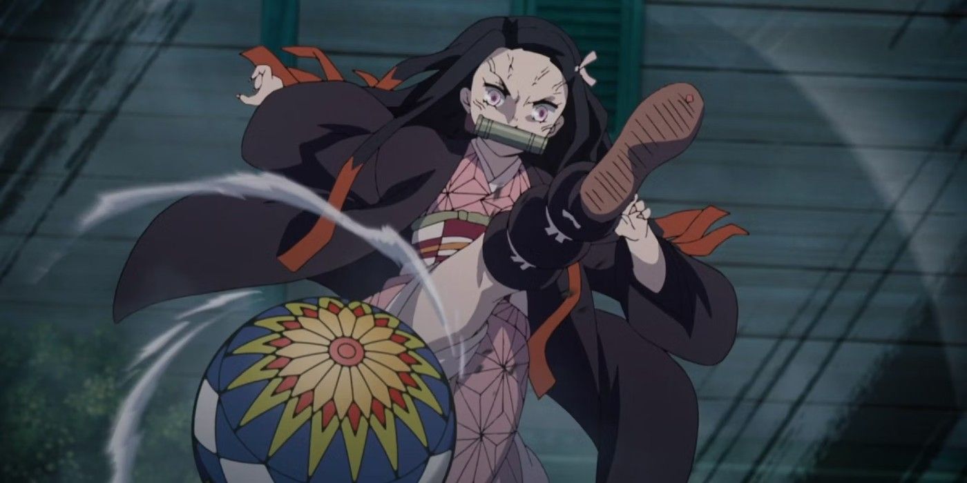 Nezuko kicking the ball back at the temari demon in Demon Slayer anime