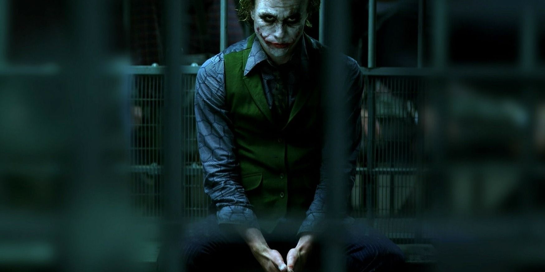 The Joker sits in a cell - The Dark Knight