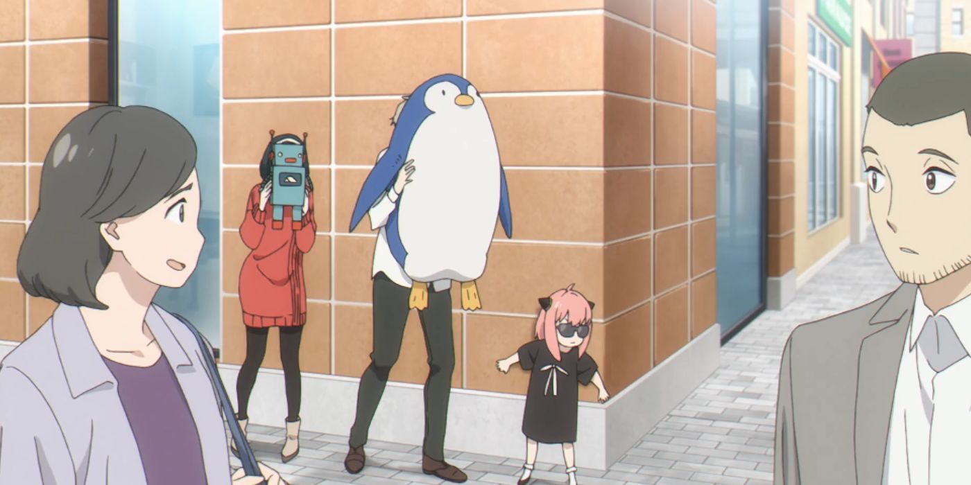 As Anya leans against a wall, Loid and Yor cover their faces with penguin and robot toys respectively