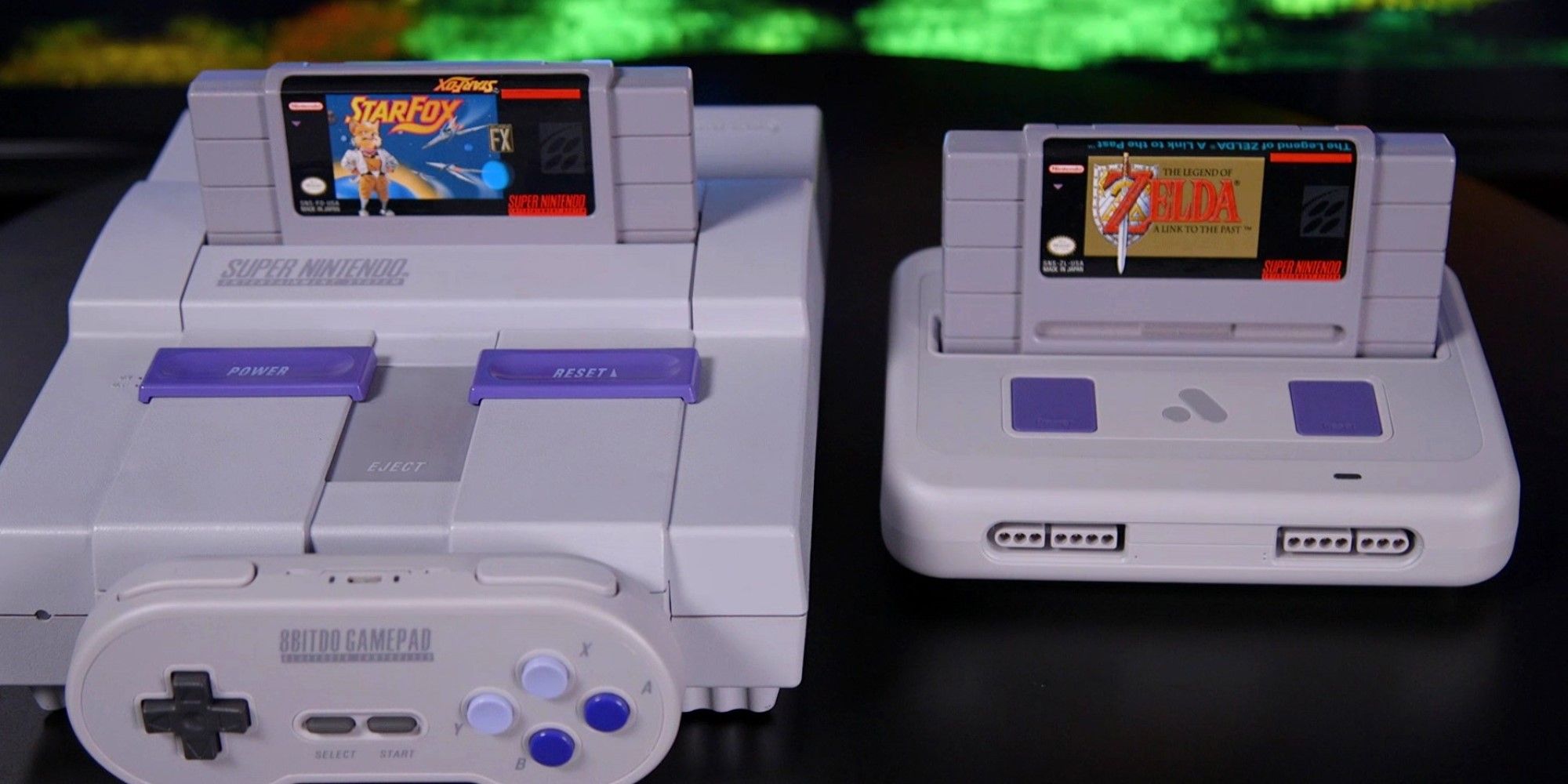 An original Super Nintendo Entertainment System (left) with the Analogue Super Nt (right)